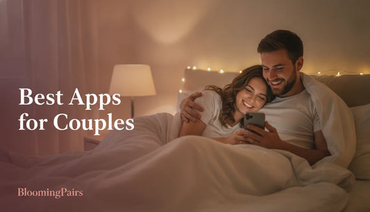 Couple looking at a phone together — best apps for couples