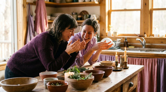 Couple talking and laughing in a kitchen — communication exercises for couples