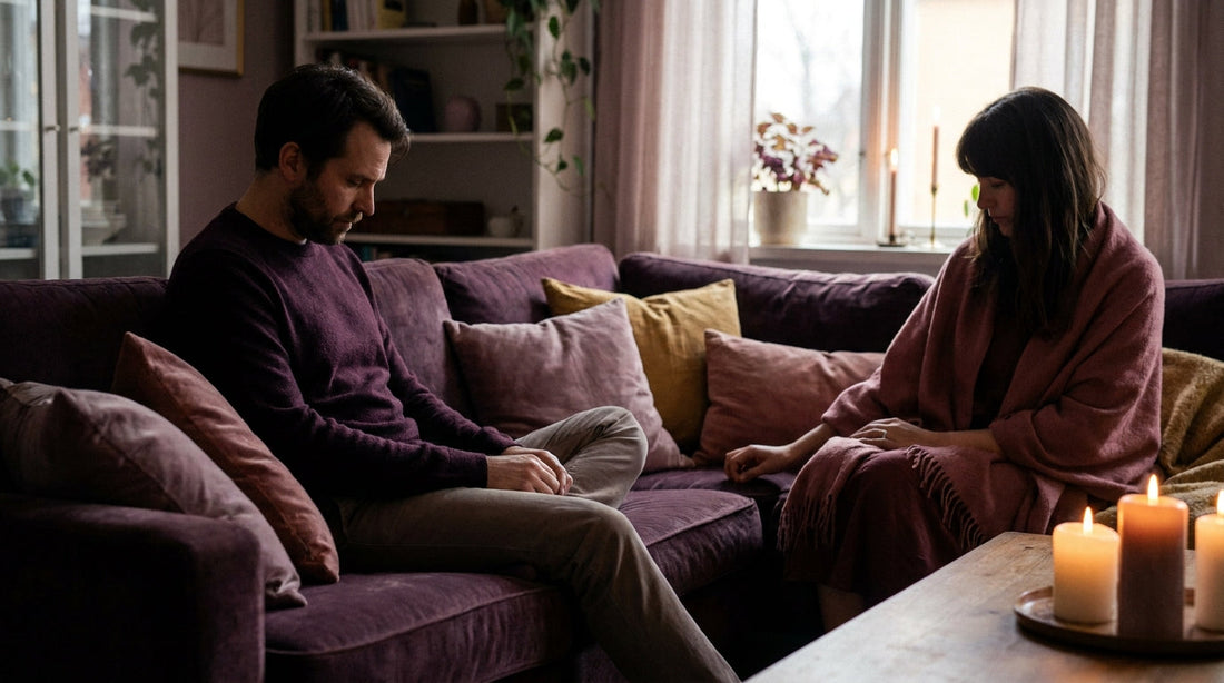 Couple sitting slightly apart at dusk — feeling disconnected from your partner